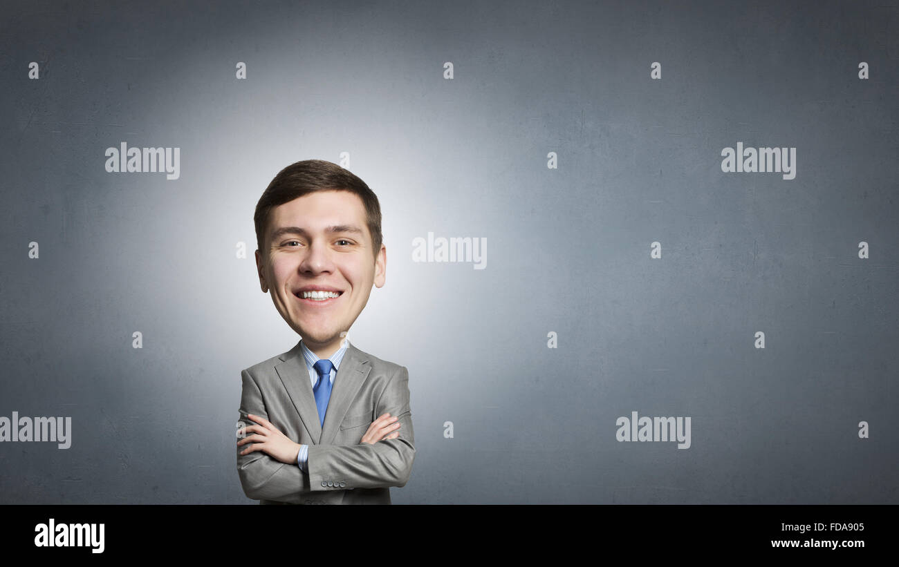 Funny smiling business man with a big head Stock Photo - Alamy