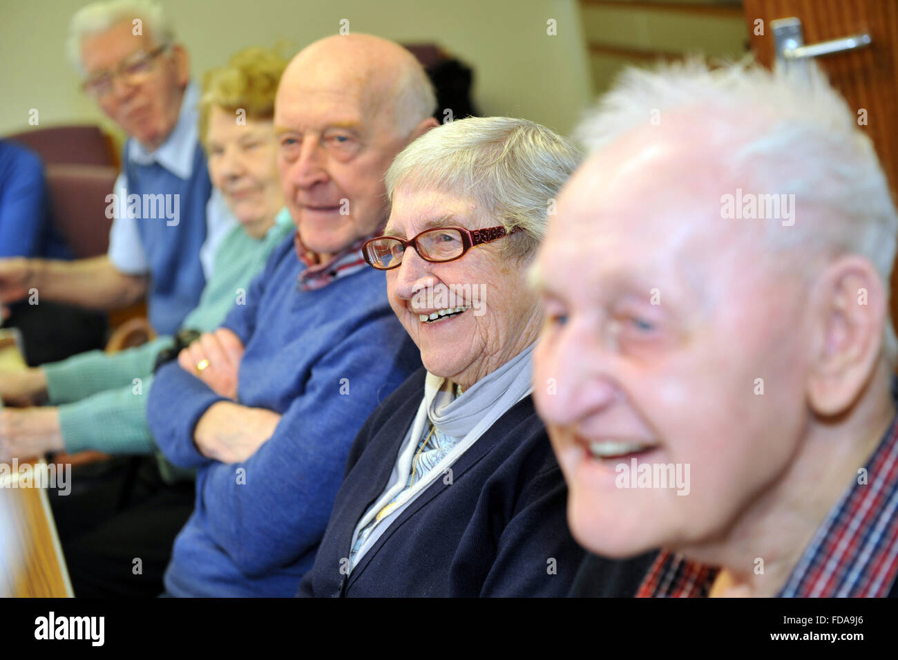 Elderly people take part in a dementia care workshop North Yorkshire UK positive Stock Photo