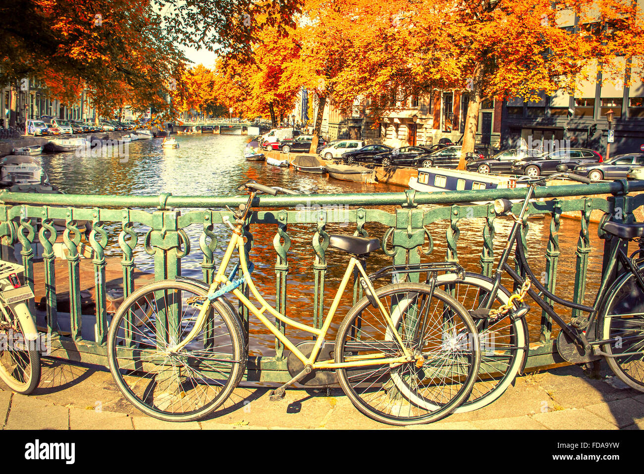 Amsterdam canal and bikes Stock Photo Alamy