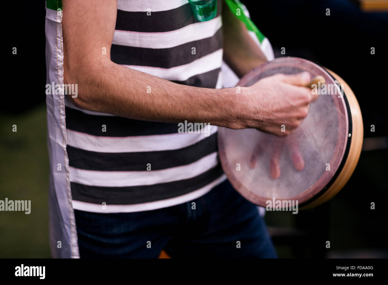 Man playing tambourine hi-res stock photography and images - Alamy