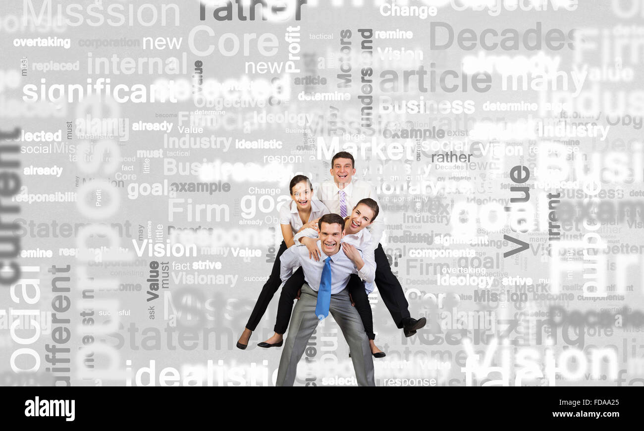 Businesspeople riding on back of their colleague Stock Photo - Alamy