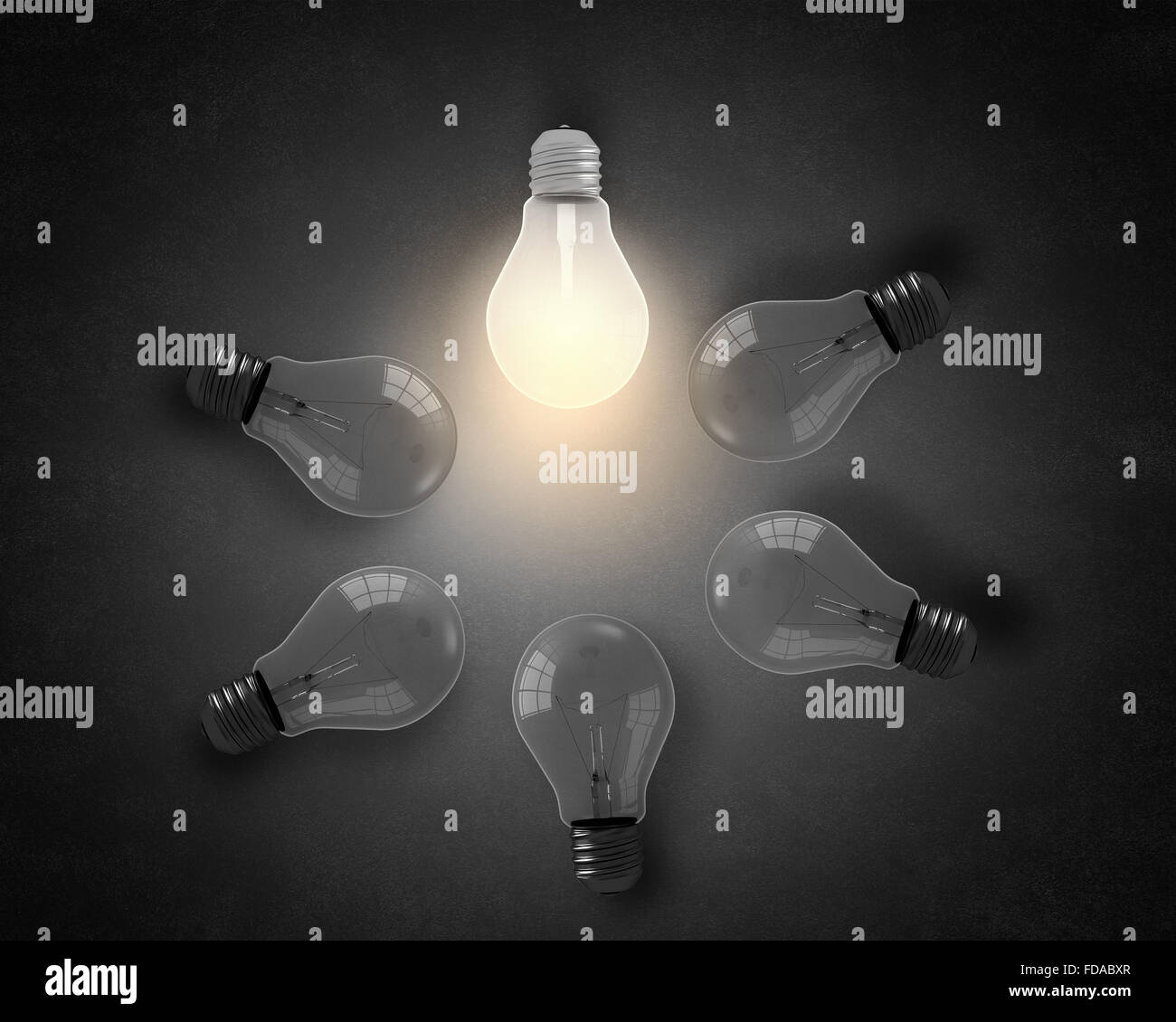 Light bulbs on dark background with one glowing Stock Photo - Alamy