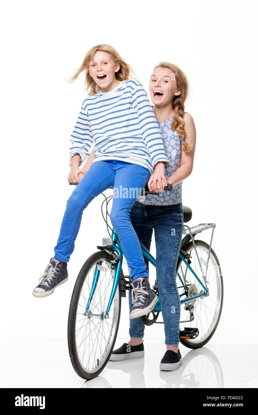 Young boy and girl on a bike Stock Photo