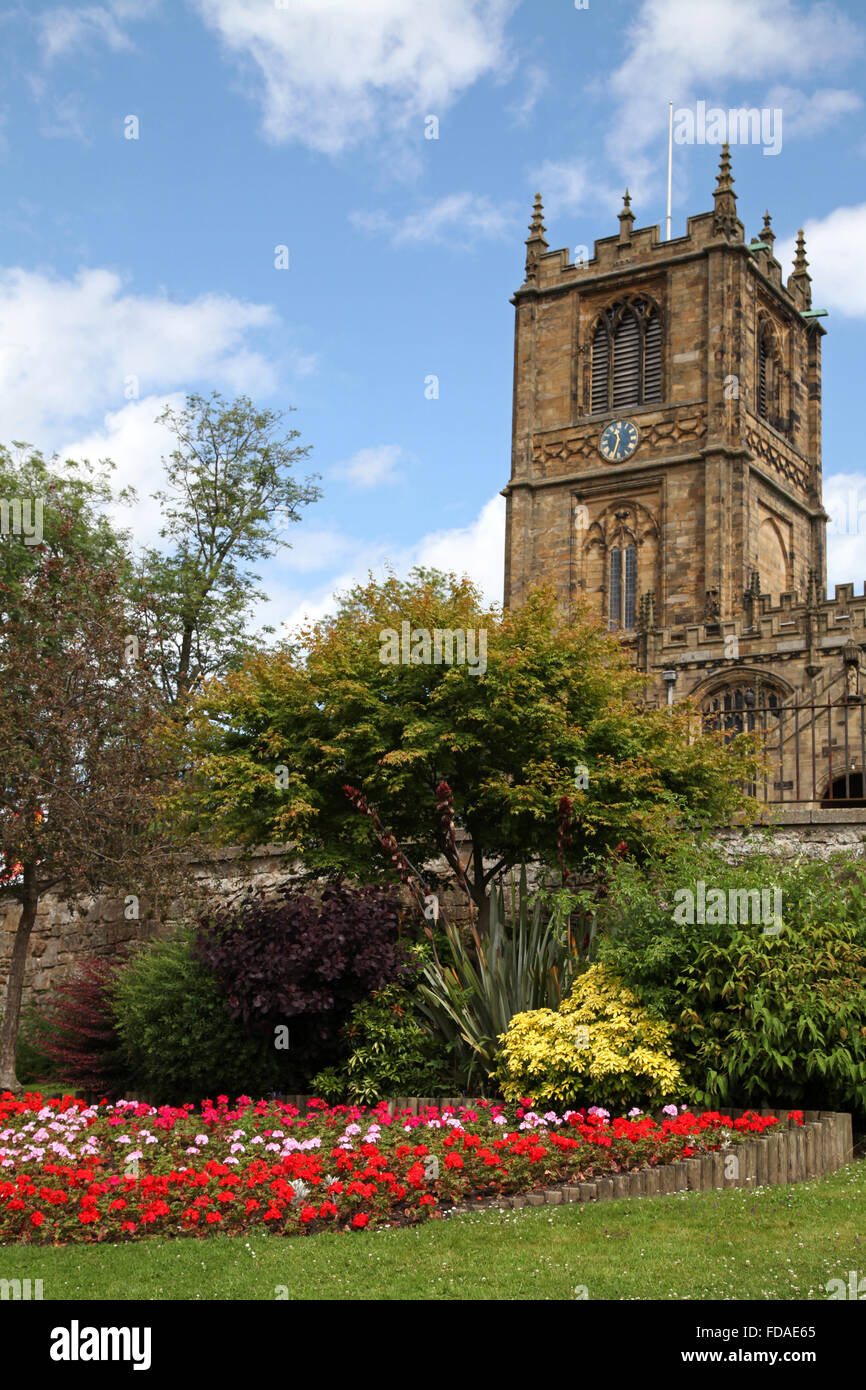 St Mary's Parish Church, Mold, Flintshire with colourful floral display