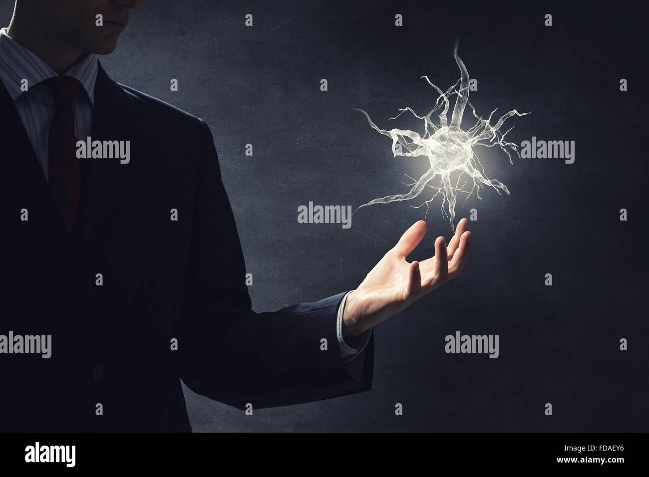 Close up of businessman holding digital image of nerve in palm Stock ...