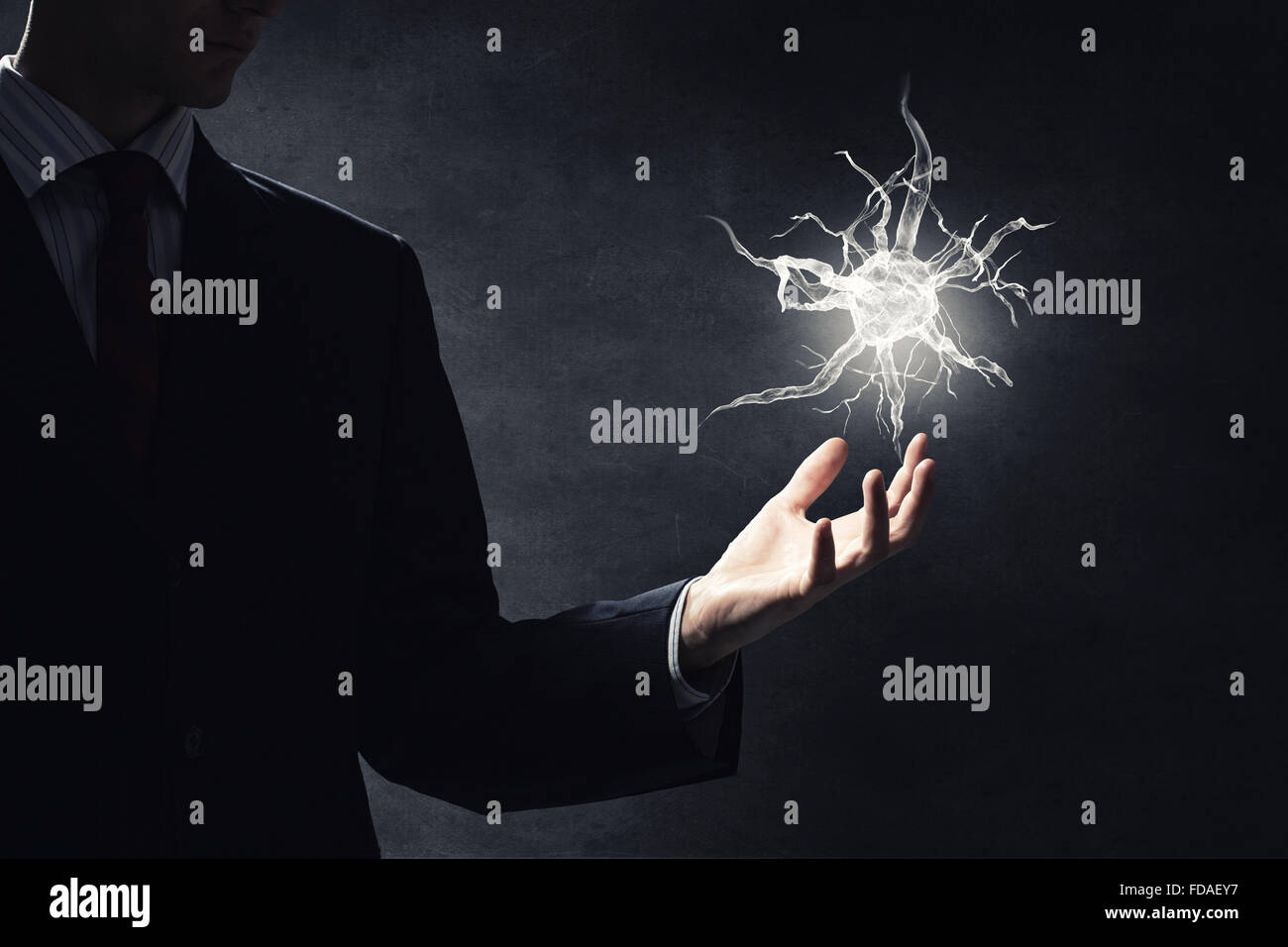 Close up of businessman holding digital image of nerve in palm Stock ...