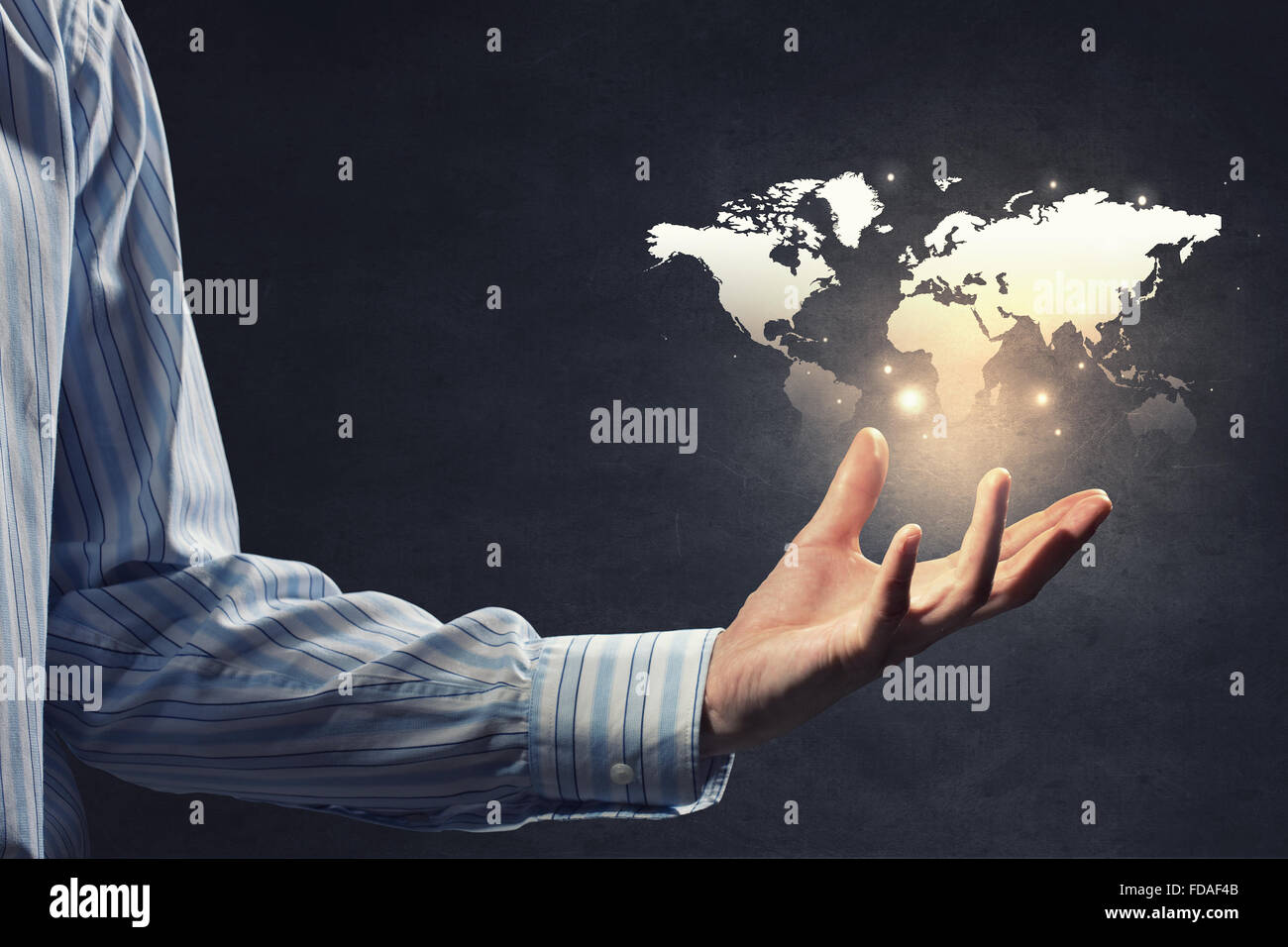 Close up of male hand holding map icon Stock Photo - Alamy