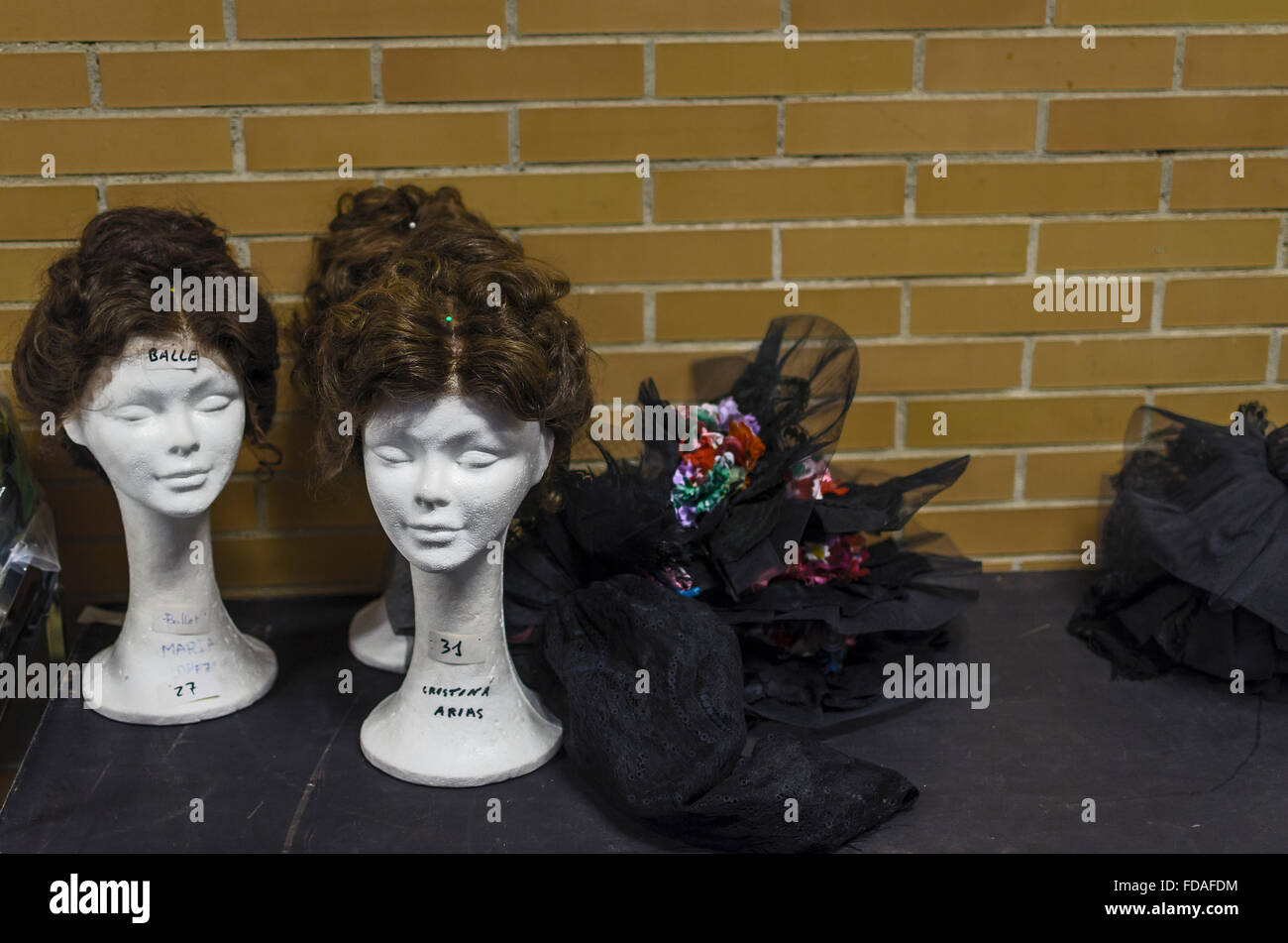 A wigs in the dressing room of a theater Stock Photo