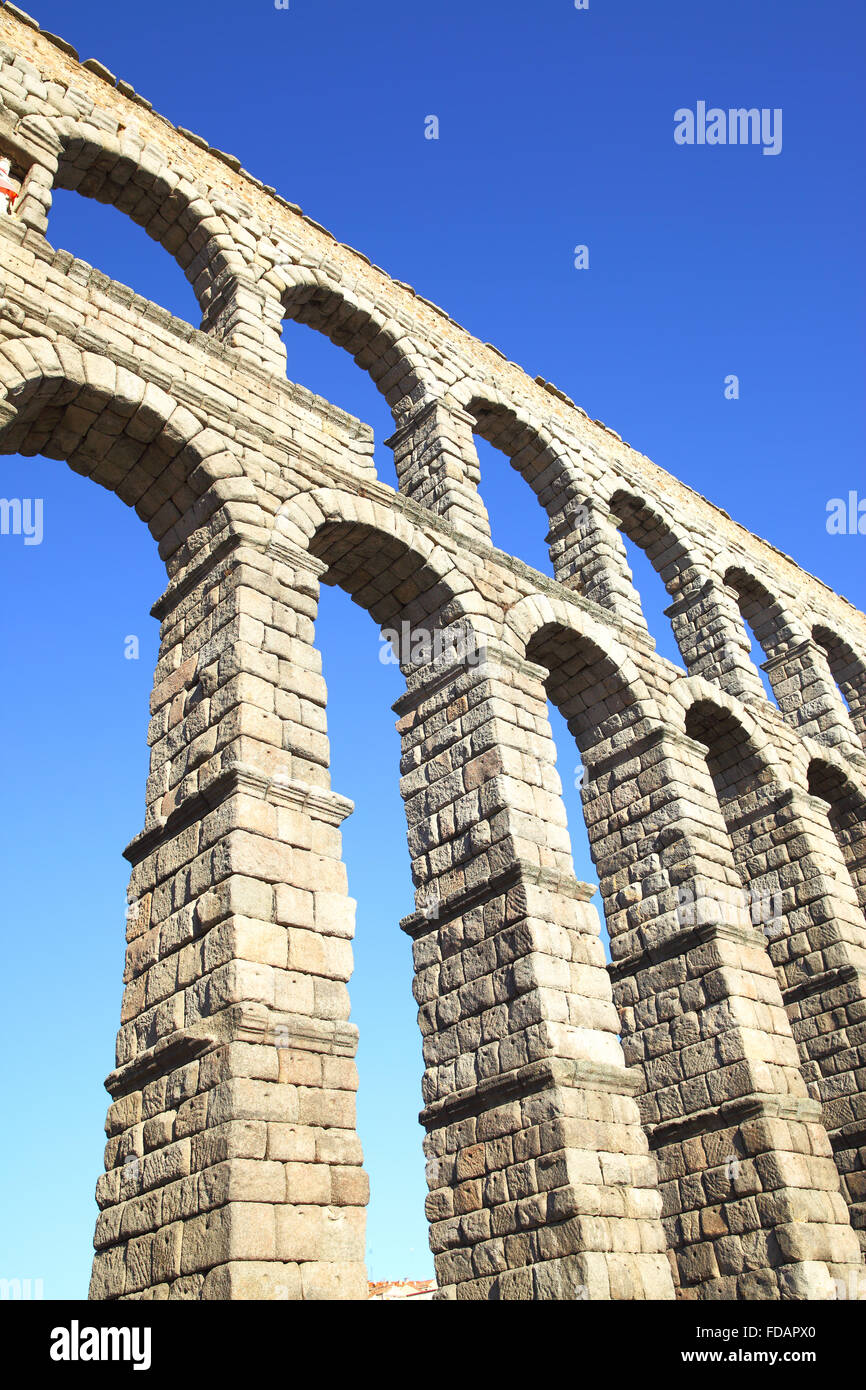 Perspective of ancient roman aqueduct in Segovia, Spain Stock Photo