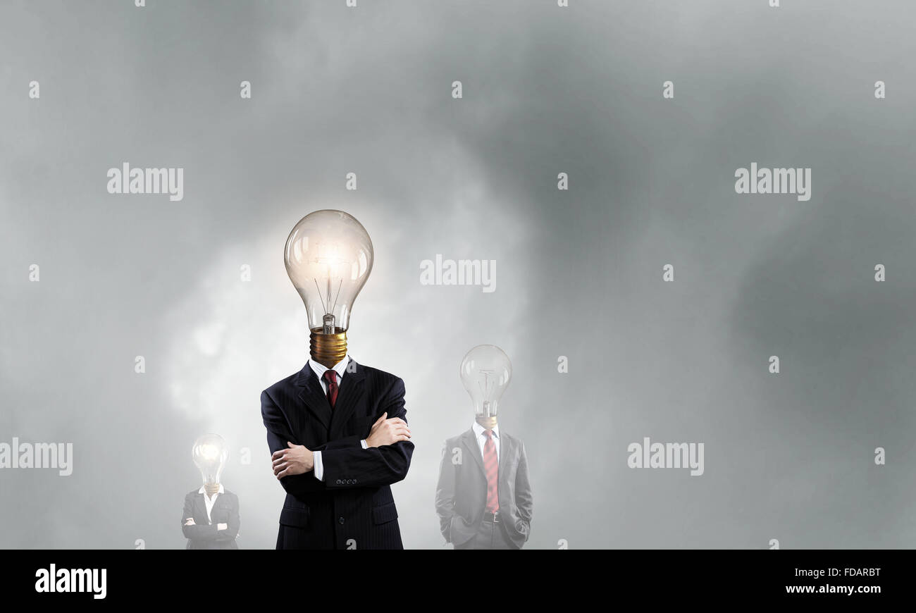 Businessman in suit with light bulb instead of head Stock Photo - Alamy