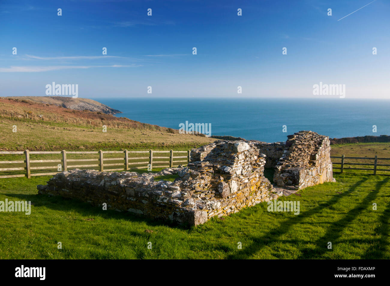 St Non's chapel ruin ruined remains Coastline in background Near St David's Pembrokeshire Wales UK Stock Photo