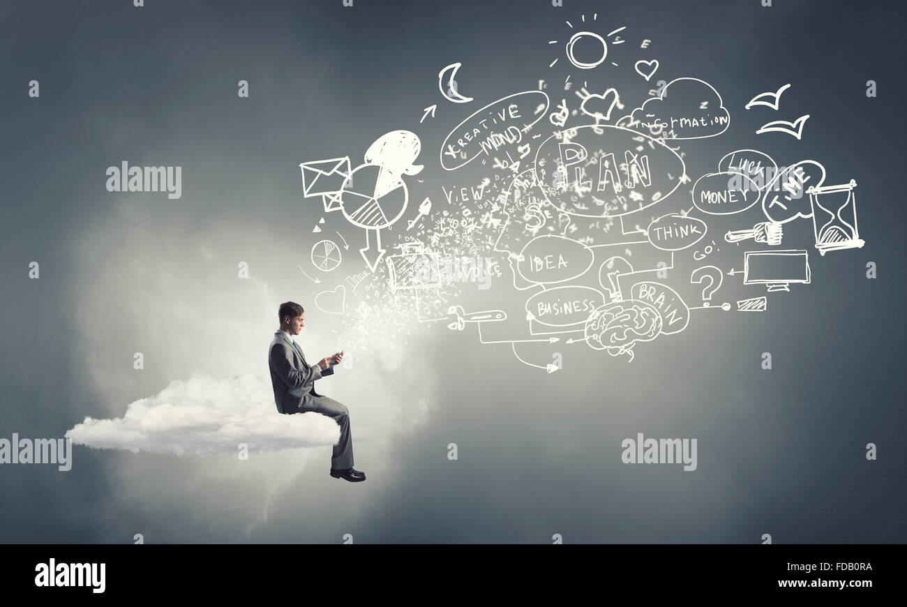 Young businessman sitting on cloud with mobile phone in hands Stock ...