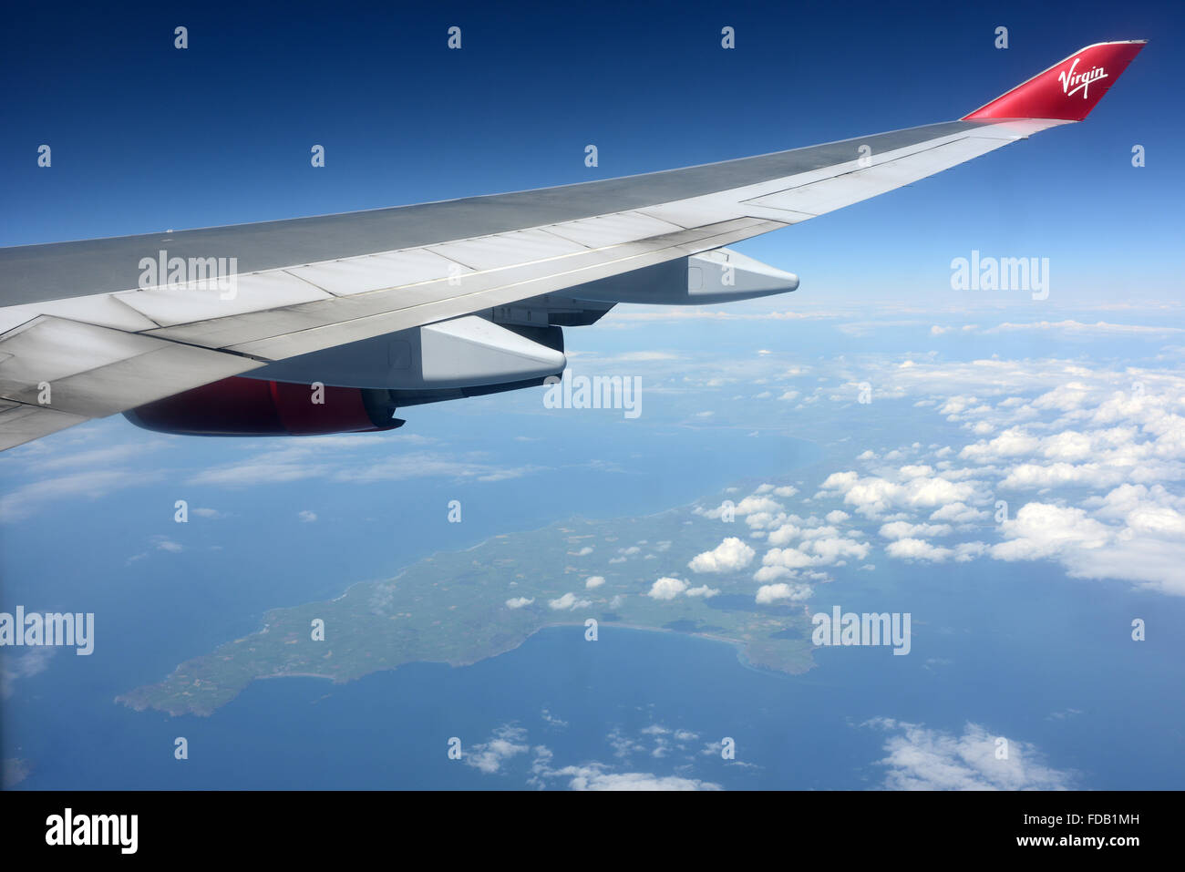 A Virgin Atlantic Boeing 747 heads out over the west coast of Wales en route to New York JFK from London Heathrow LHR Stock Photo