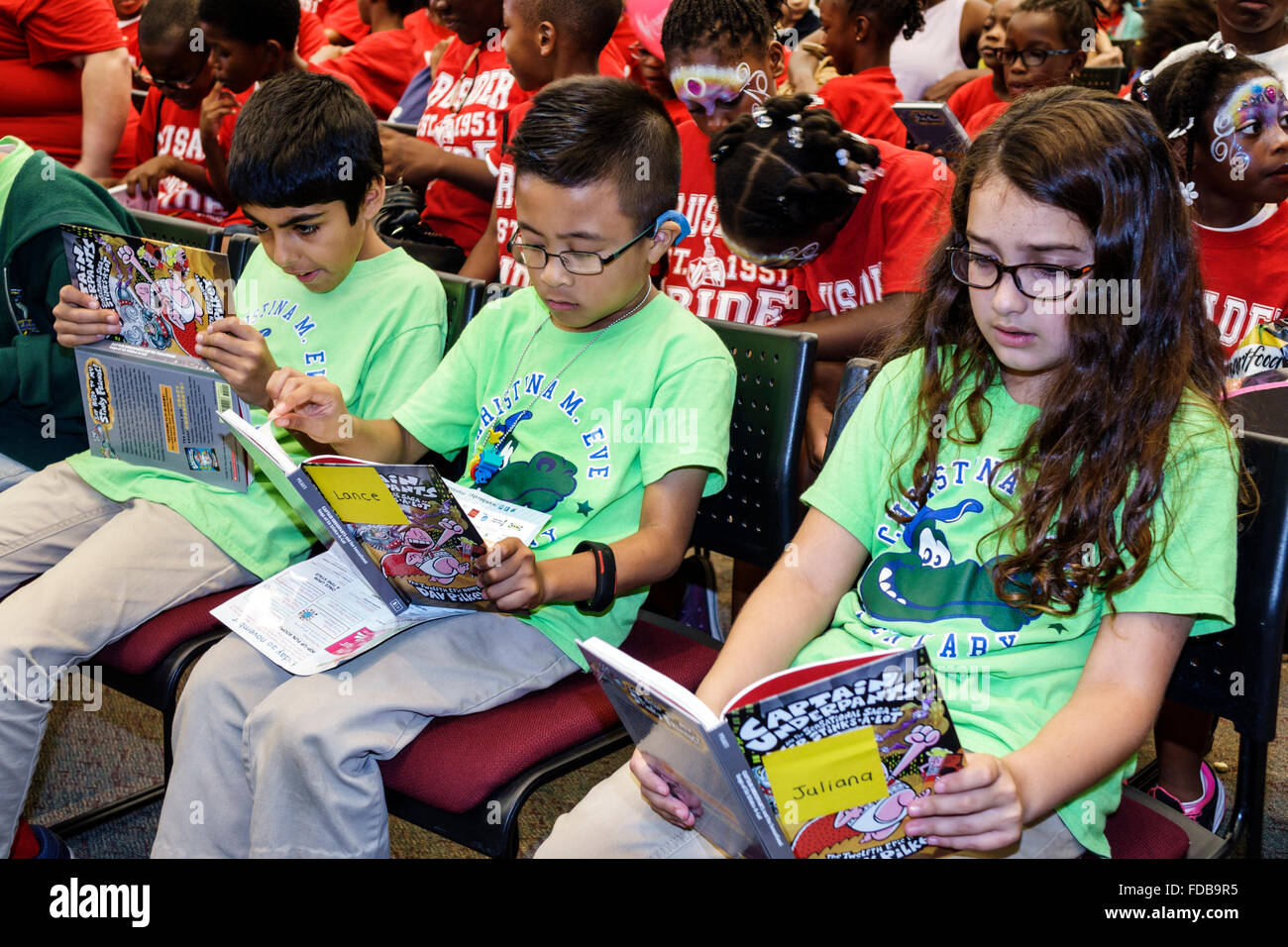 Miami Florida,Book Fair International,Miami Dade College campus,literary,festival,annual student,Asian male boy boys kids children class field trip,re Stock Photo