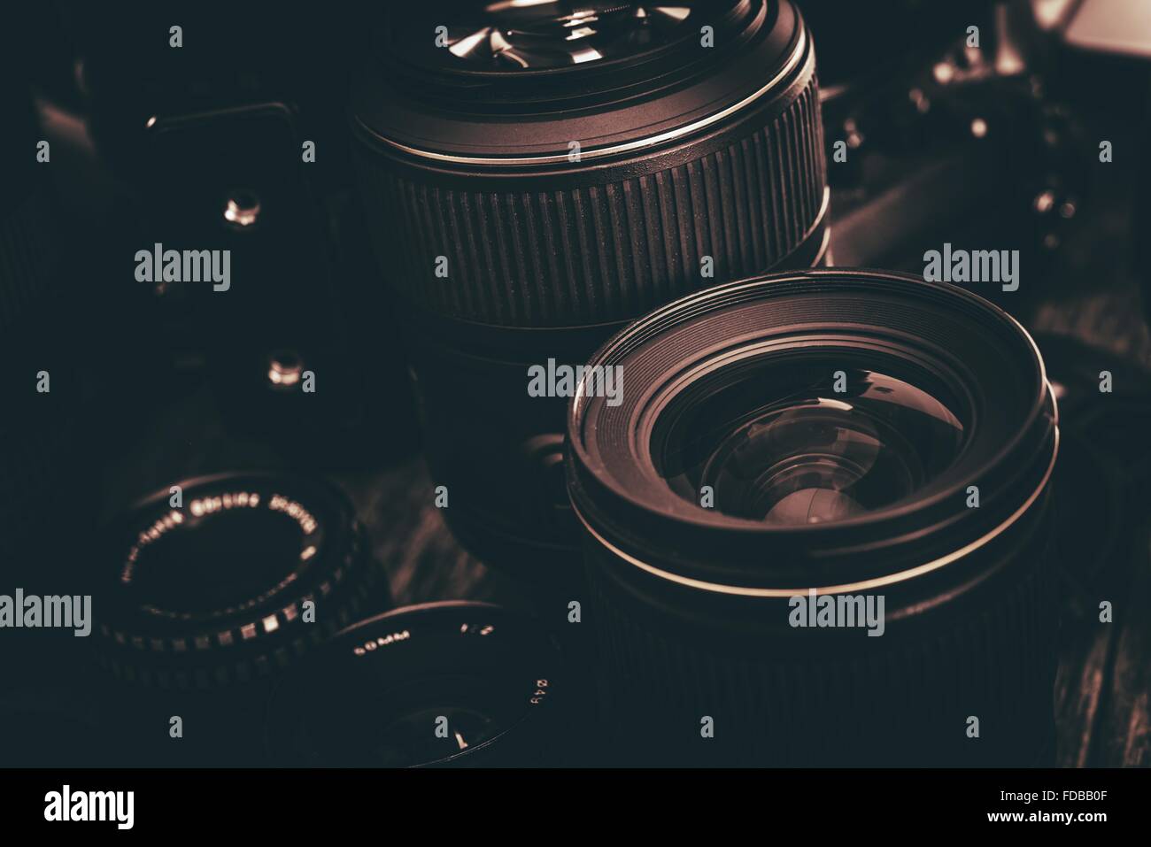 Photo Lenses Kit. Professional Photography Lenses Closeup. Dark Brown