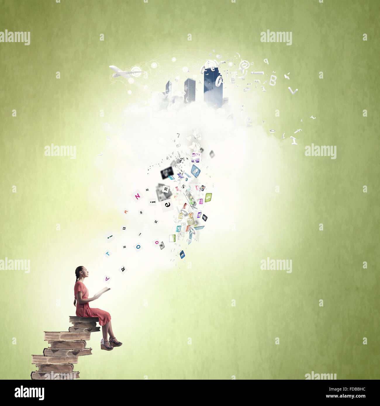 Young girl sitting on stack of books and reading Stock Photo - Alamy