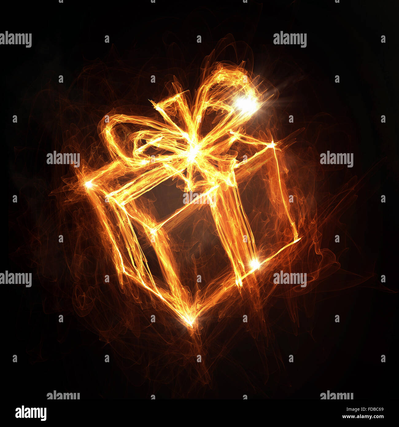 Glowing fire gift box icon on dark background Stock Photo - Alamy