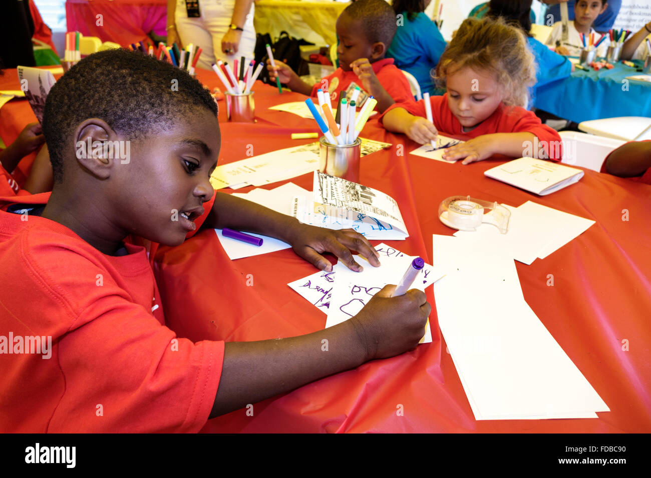 Miami Florida,Book Fair International,Miami Dade College campus,literary,festival,annual arts & crafts,tent,coloring,drawing,daycare,student students Stock Photo