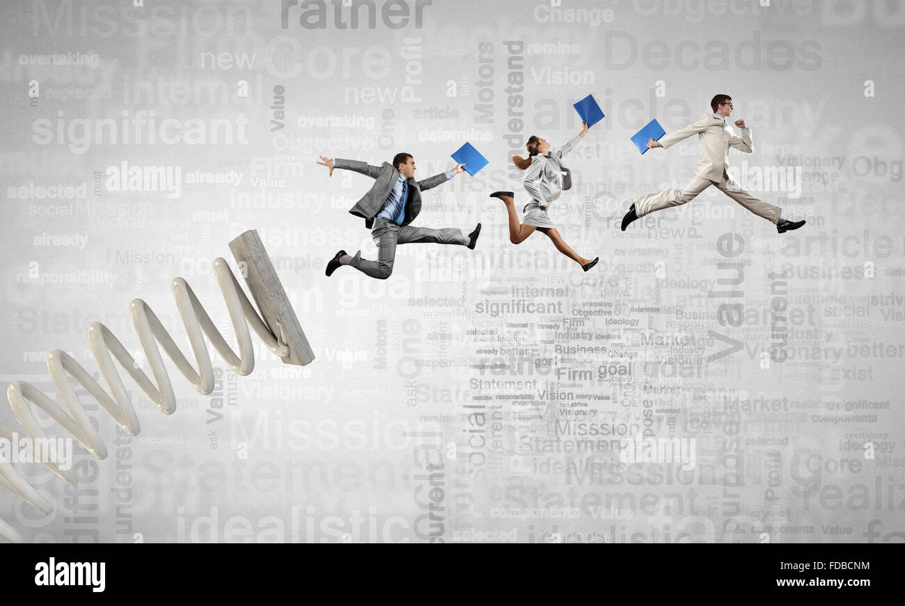 Business people jumping on springboard as progress concept Stock Photo ...