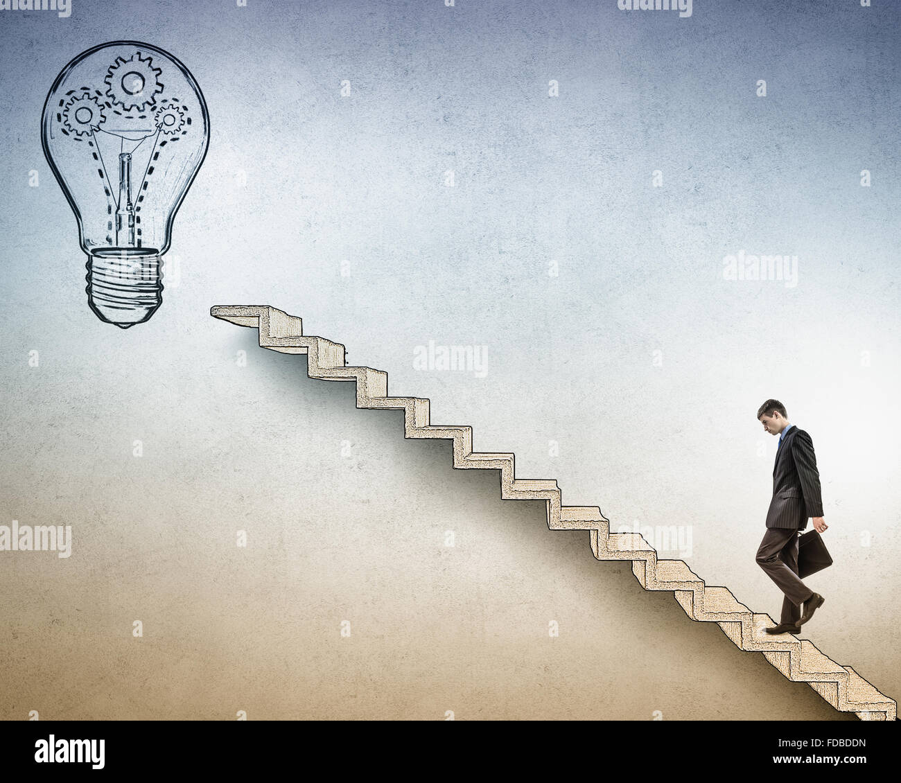 Young businessman walking up on staircase representing success concept ...
