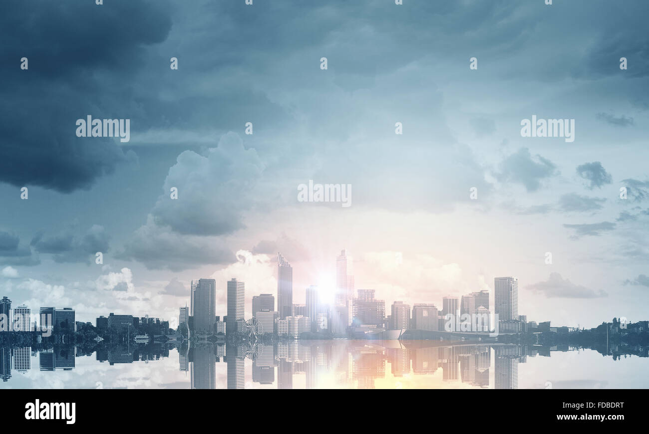 Panoramic modern city view in lights of sunrise Stock Photo - Alamy