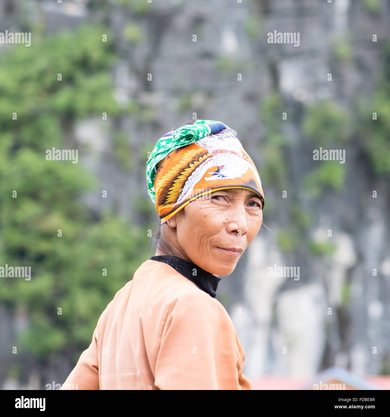 Vietnamese woman, Halong Bay, Vietnam Stock Photo