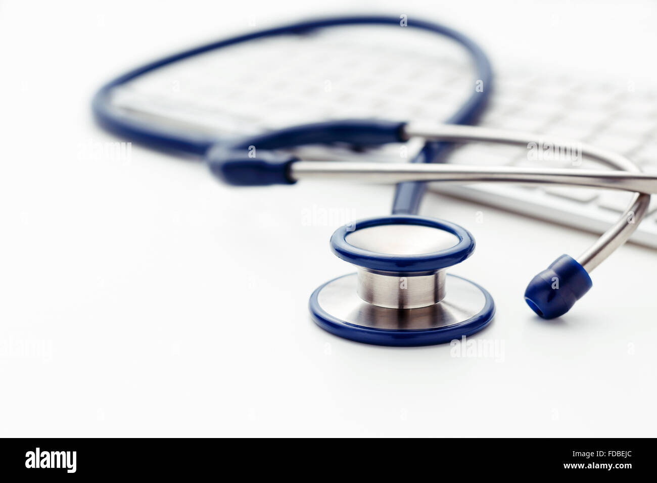 Medical stethoscope with computer keyboard background Stock Photo - Alamy