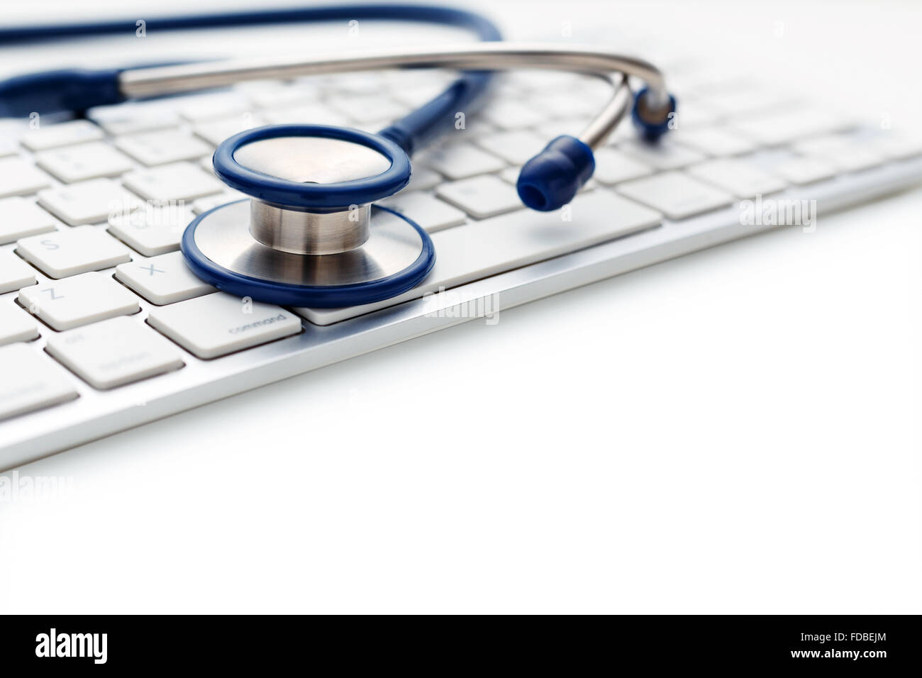 Medical stethoscope on computer keyboard on white background Stock ...