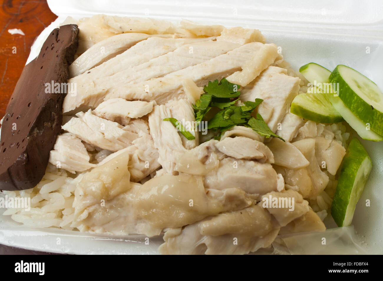Hainanese Chicken Rice in the Styrofoam Box Stock Photo