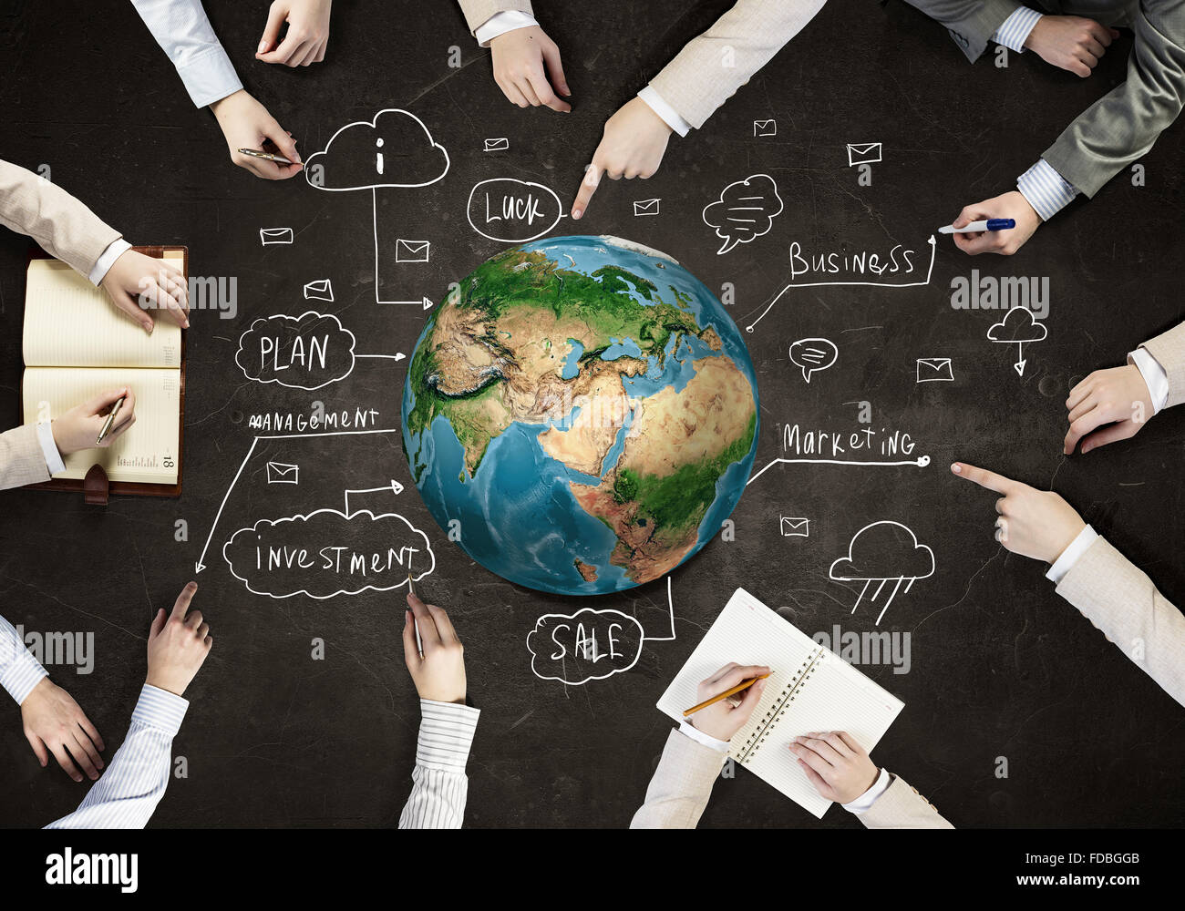 Top view of people hands drawing marketing strategy. Elements of this image are furnished by NASA Stock Photo
