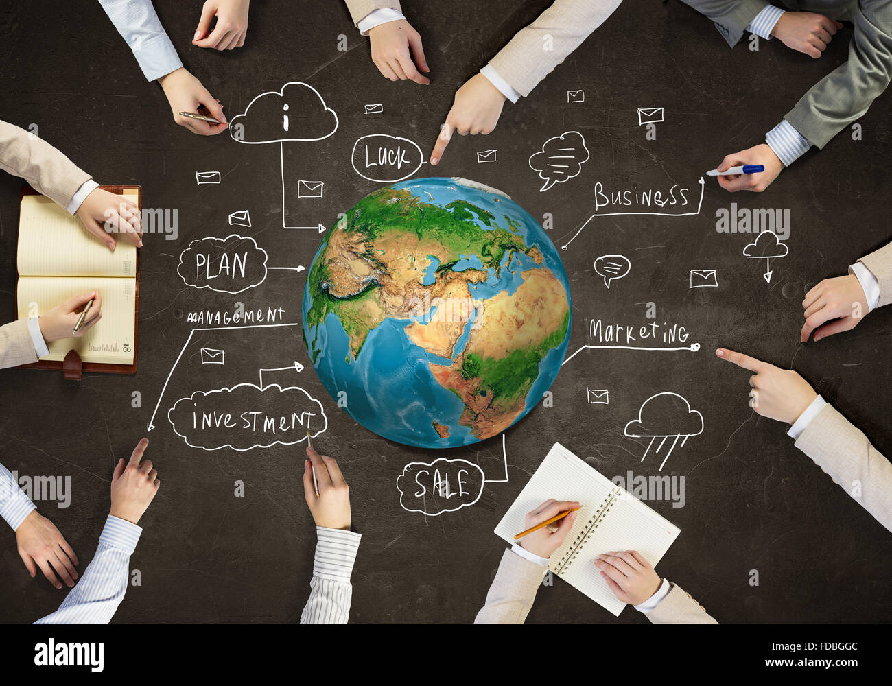 Top view of people hands drawing marketing strategy. Elements of this image are furnished by NASA Stock Photo
