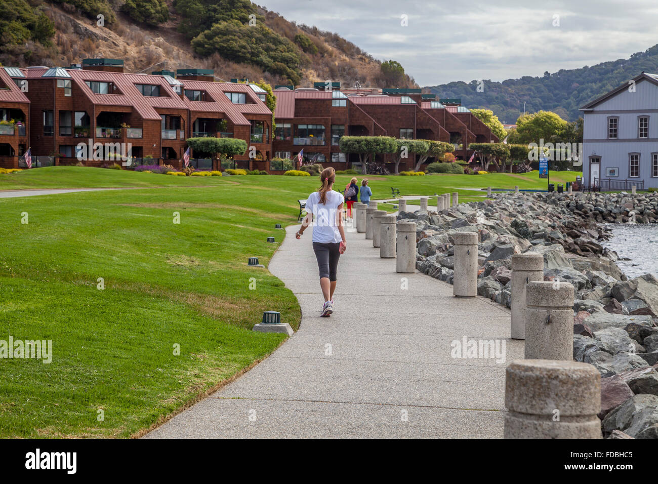 Woman having a walk in Tiburon waterfront, Tibuton, California, USA Stock Photo
