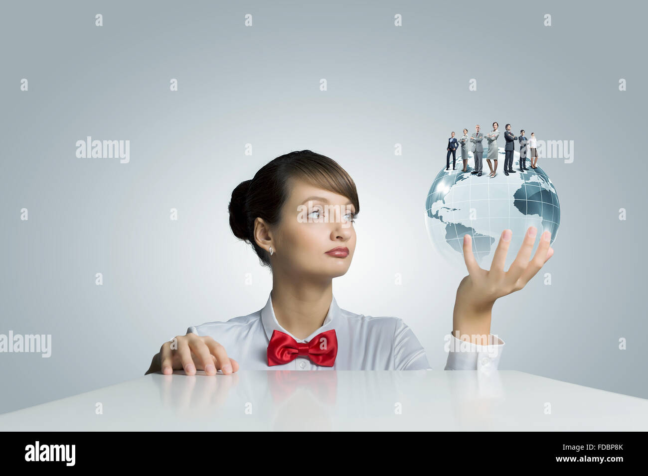 Young woman holding digital Earth planet in hand Stock Photo - Alamy