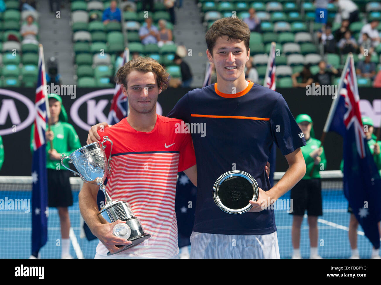 Melbourne, Australia. 30th Jan, 2016. Oliver Anderson (L) of Australia and Jurabeck Karimov of Uzbekistan pose during the award ceremony after their junior boys' singles final match at Australian Open Tennis