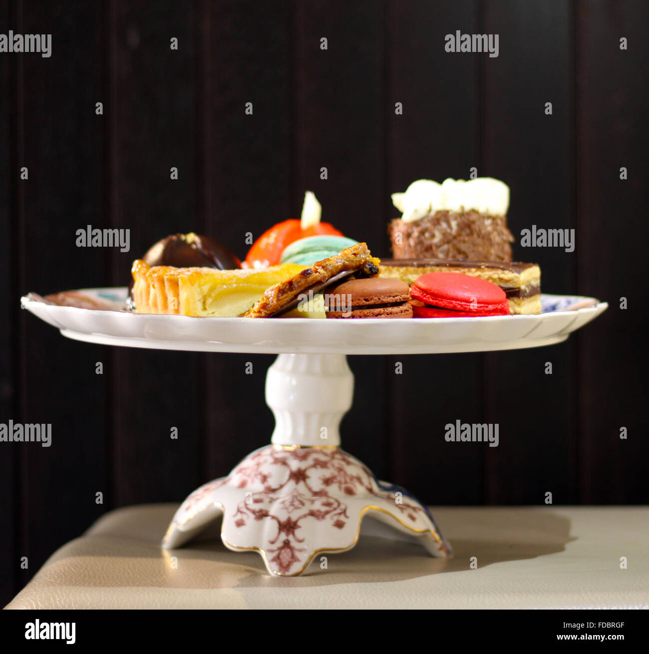 French desserts in fancy porcelain plate Stock Photo Alamy