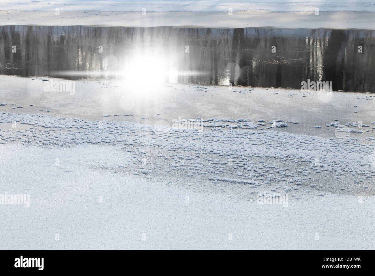 Winter rural landscape Frozen River in the forest Stock Photo - Alamy