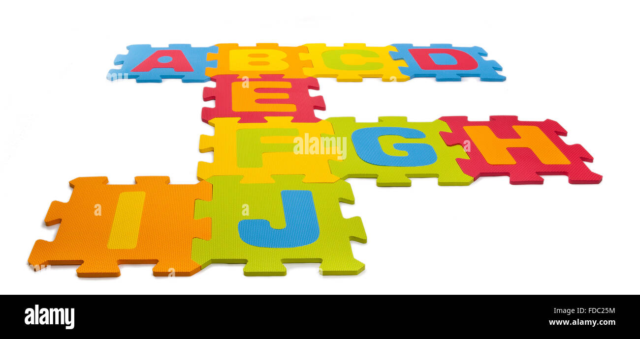 Alphabet Puzzle Pieces on White Background Stock Photo - Alamy