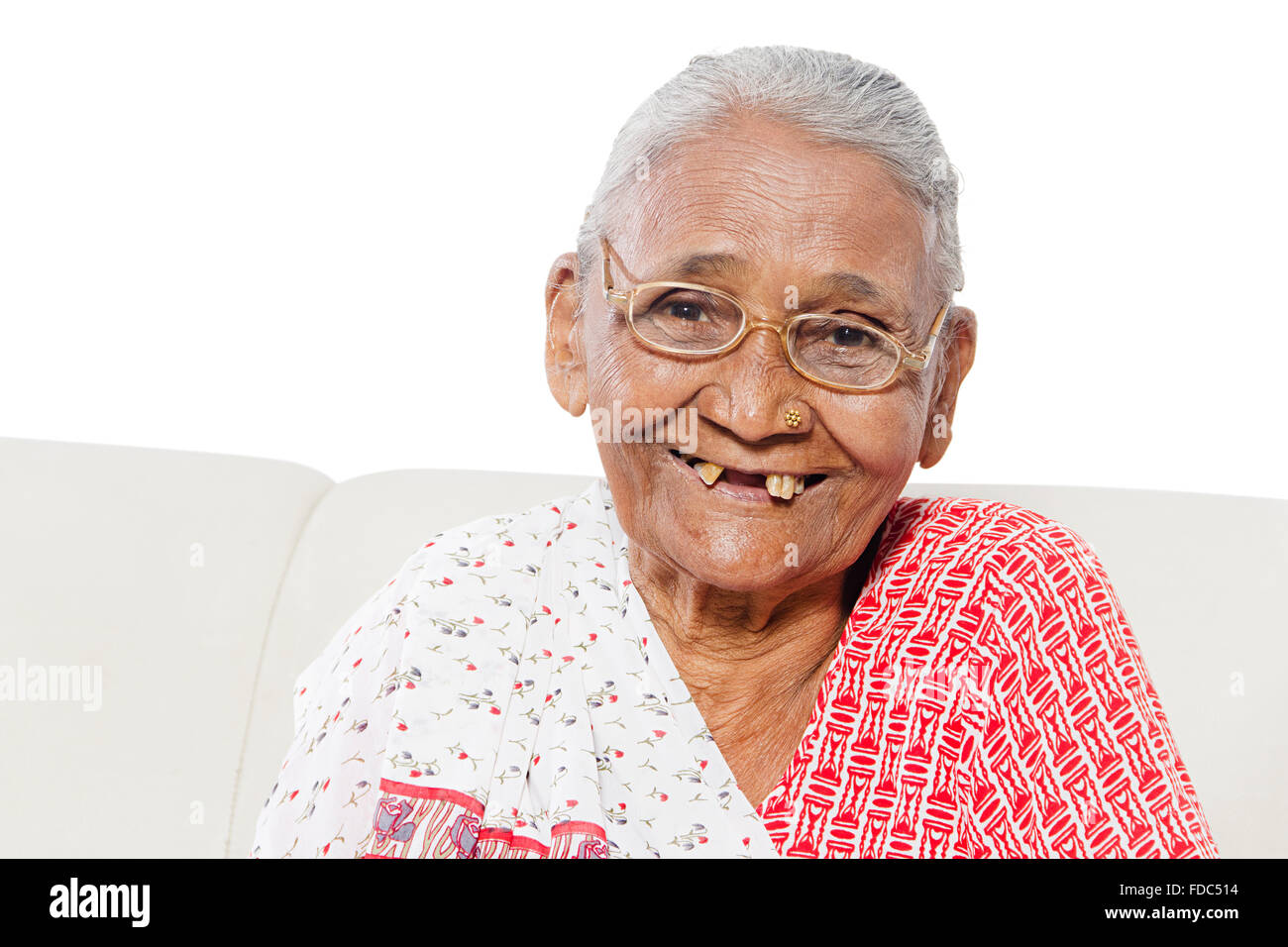1 Senior Adult Woman Smiling Sitting Sofa Stock Photo