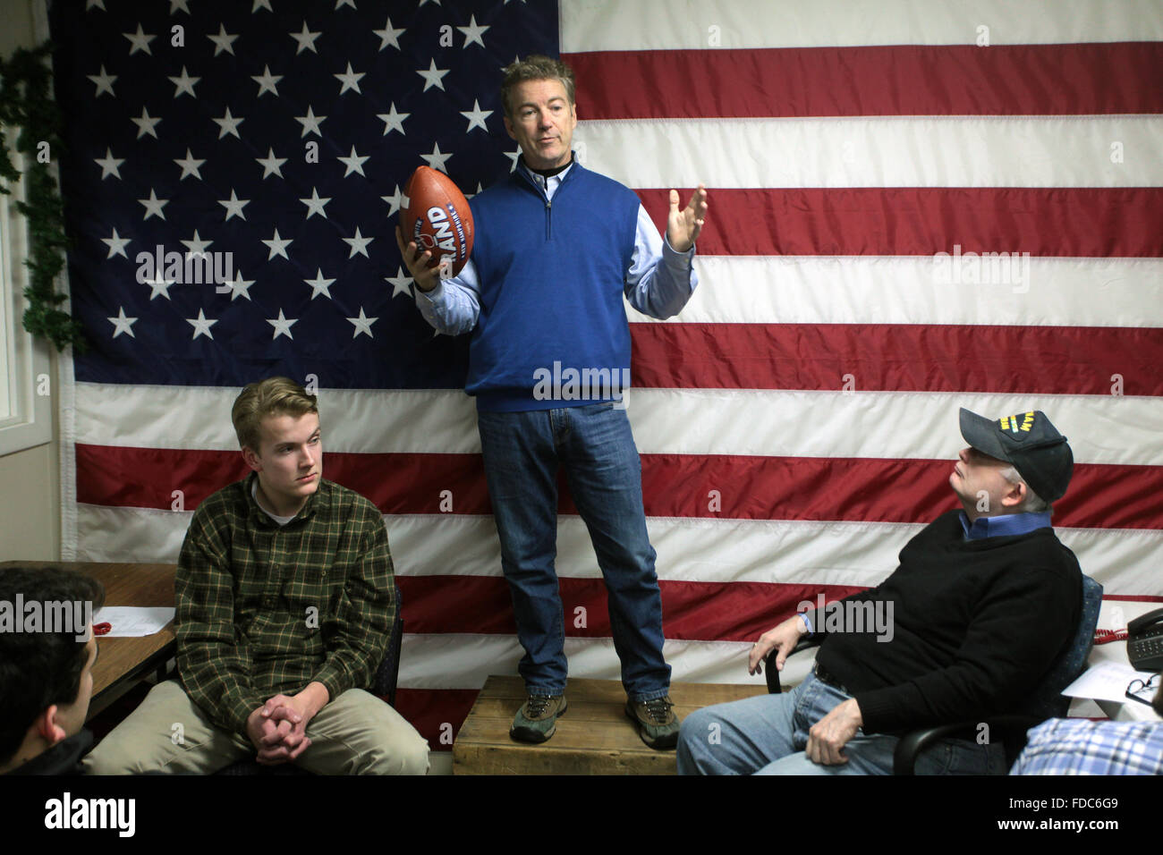 Senator Rand Paul and GOP presidential candidate addresses campaign volunteers while holding a football January 22, 2016 in Manchester, New Hampshire. Stock Photo