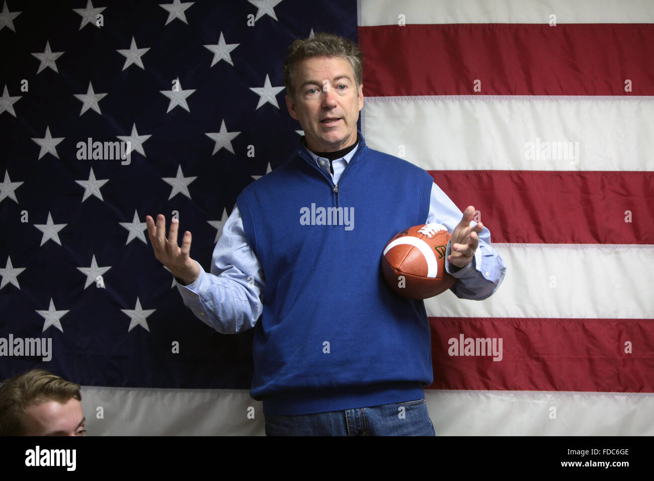 Senator Rand Paul and GOP presidential candidate addresses campaign volunteers while holding a football January 22, 2016 in Manchester, New Hampshire. Stock Photo