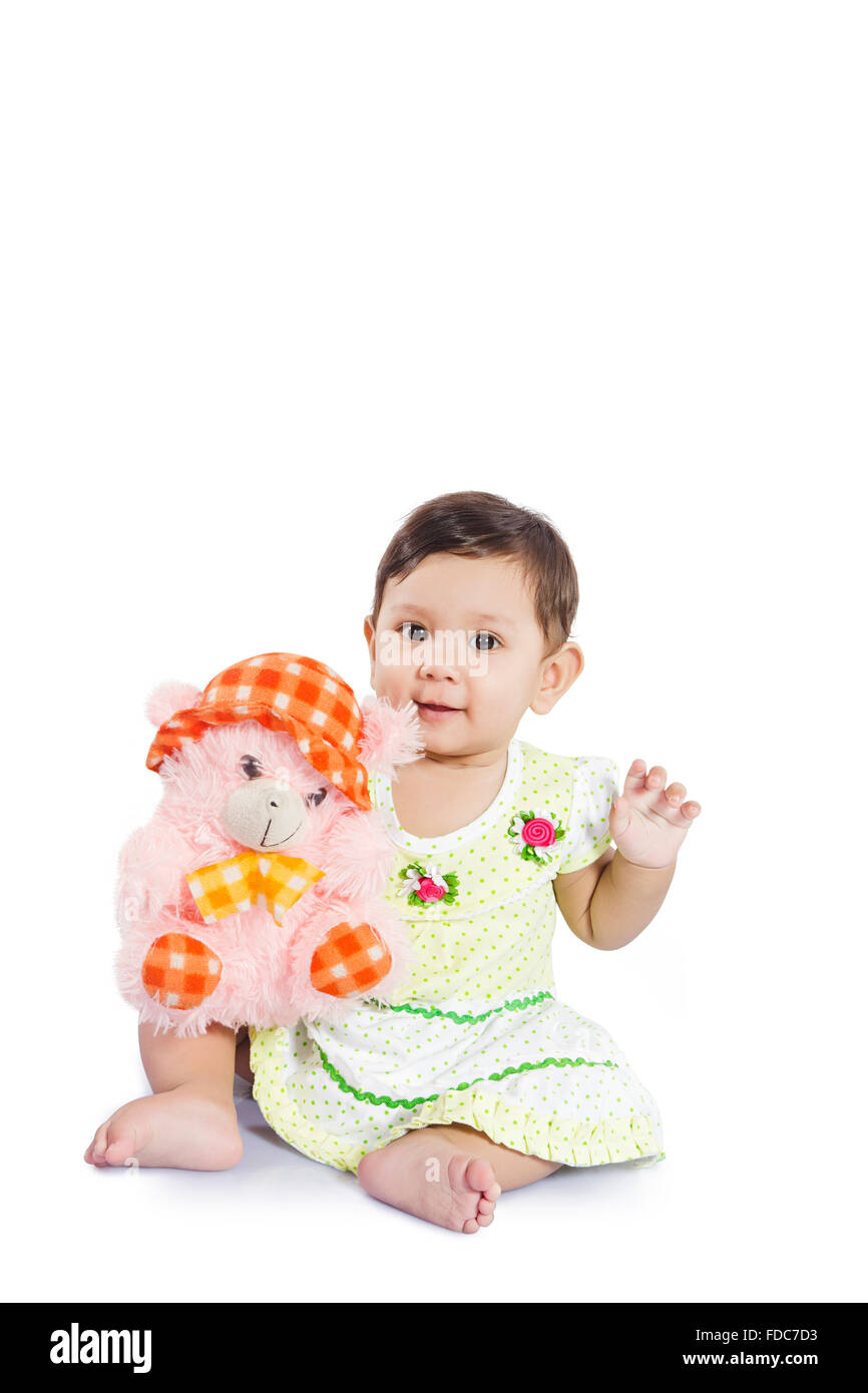 1 Child Baby Girl Sitting Playing Stuffed toys Stock Photo