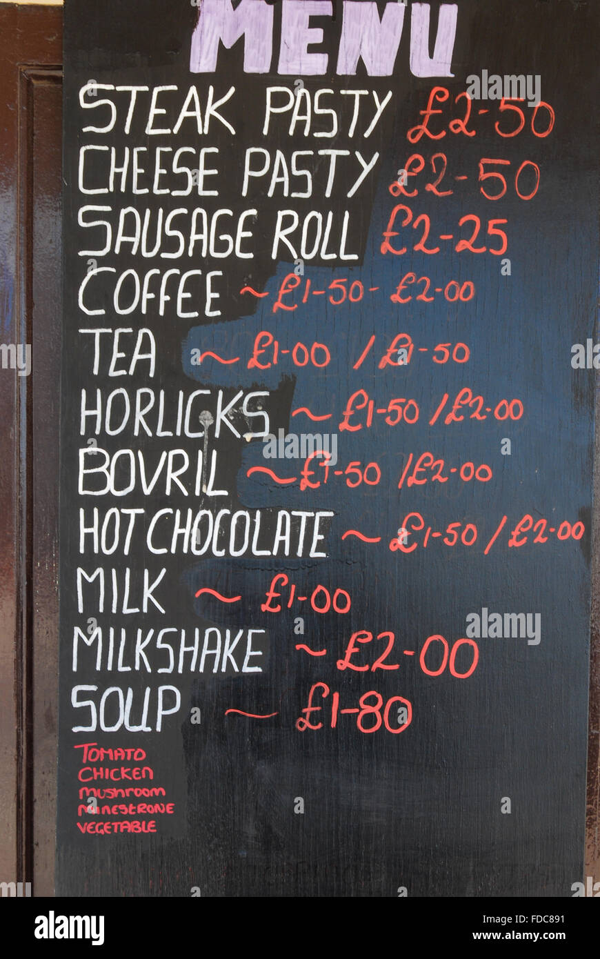 Cafe menu in Exmouth, Devon, England with pasty, sausage roll and