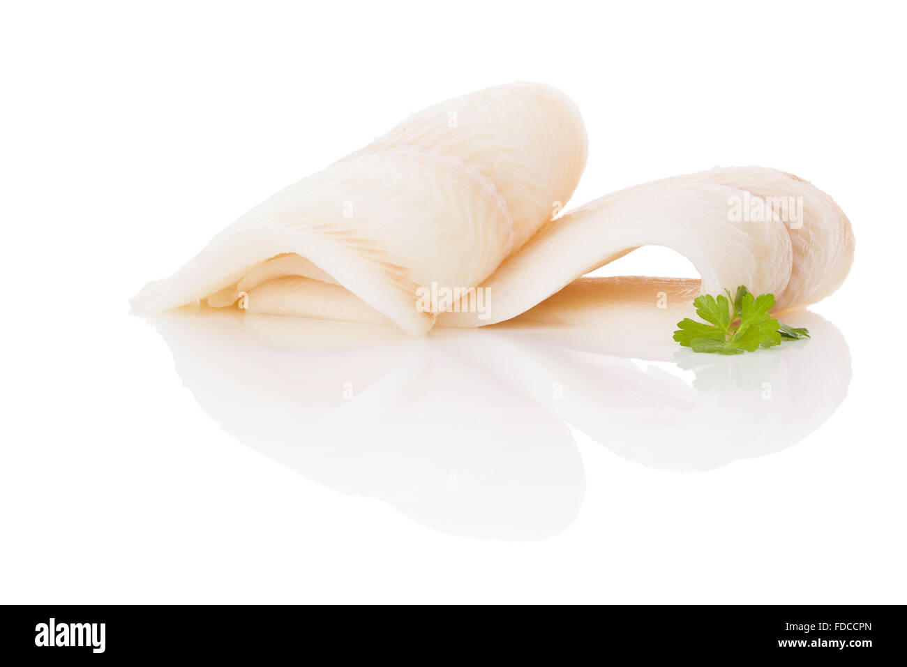 Raw fresh halibut steak isolated on white background. Culinary healthy