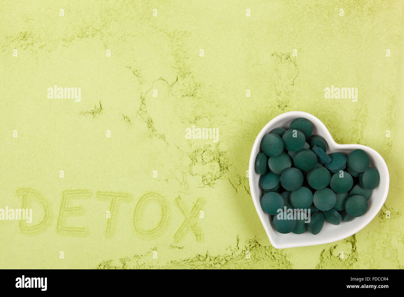 Spirulina; chlorella and wheatgrass. Green food supplement. Green pills ...