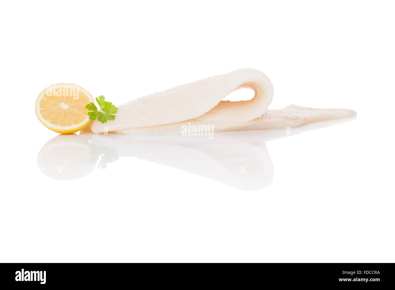 Raw fresh halibut steak isolated on white background. Culinary healthy