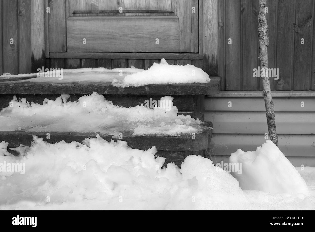 Snow Melting Near Door Stock Photo Alamy