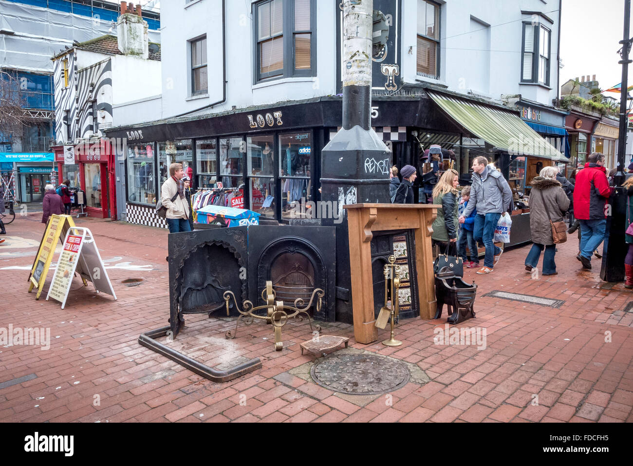 Antique furniture on display in the street in Brighton's North Laine area. Stock Photo
