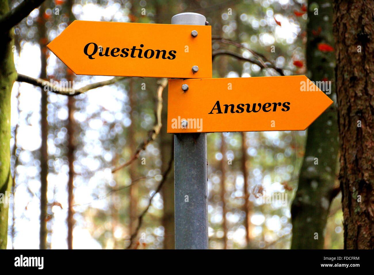 Questions and Answers written on a direction sign Stock Photo