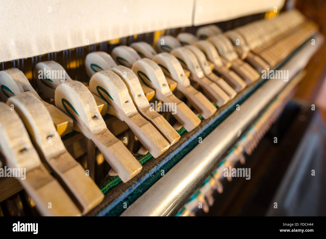 Upright piano hammers detail Stock Photo