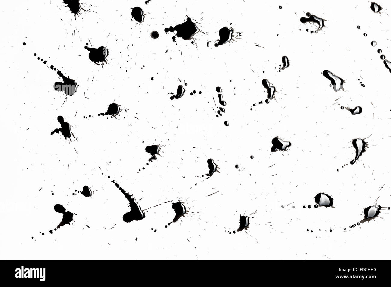 Abstract image with splashes of black paint on white background Stock Photo